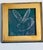Abstract mixed media by Elia Moon Bunnies series , on brown recycled paperboard, framed in wide gold frame.