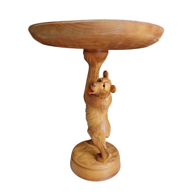 A beautiful carved bear wooden black forest fruit bowl. In excellent condition. The eyes of the bear are made of glass....