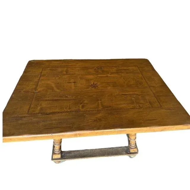 A mid 19th century Jogl tavern dining table in chalet style, from Switzerland. Measures 54"W x 39"D x 30.5"H. The base is...