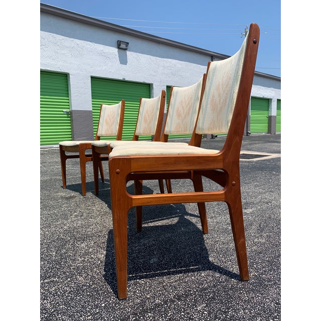 For sale are six mid century modern D-as an teak dining chairs. Two arm chairs and four side chairs. They are all in great...