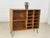 For sale is a beautiful vintage teak sideboard in well-maintained condition. A particular highlight is the flexible...