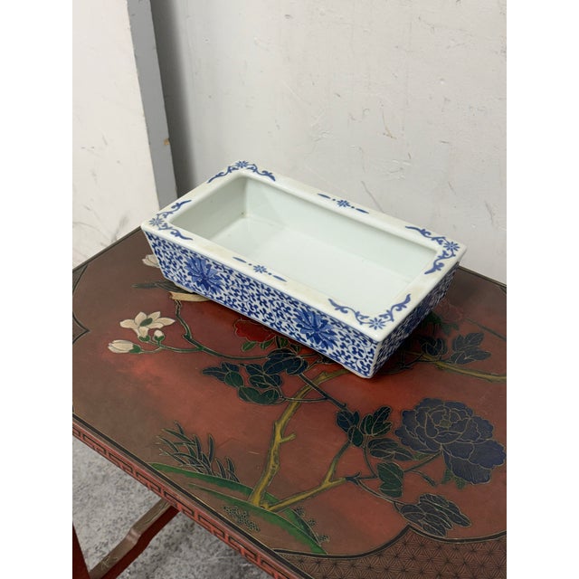 Design Plus Gallery presents a Vintage Blue + White Floral Ceramic Rectangular Planter. This ceramic rectangular planter...