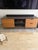 2010's CB2 "Congo" media console in great condition--no watermarks or scratches. Mixed color woods offer an interesting...