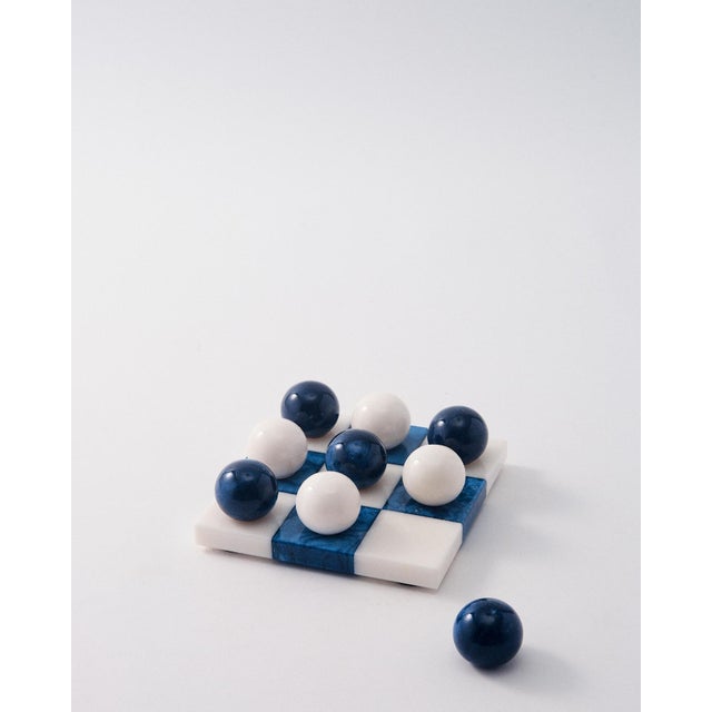 Skilled artisans carved this luxury tic-tac-toe set from Italian Alabaster, a natural stone native to Volterra, Italy....