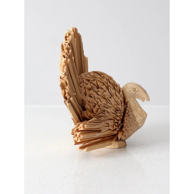 Gobble, gobble! Adorn your Thanksgiving tabletop with this vintage natural woven turkey.