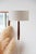 A vintage teak and brass floor lamp with a scandinavian design this vintage teak and brass floor lamp embodies the...