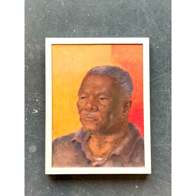 This emotive original oil painting is a soulful example of mid-to-late 20th-century figurative art. The portrait captures...