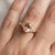 Graceful and romantic, this exquisite ring features a captivating Morganite gemstone, beautifully set in a timeless design...