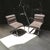 Striking pair of vintage Italian Modern cantilever lounge chairs featuring sleek polished tubular chrome frames and...