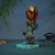 This vibrant brass figurine features a highly detailed parrot perched upon a sculpted tree trunk base. The bird is crafted...
