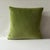 Custom-tailored 20” pillows in Brunschwig & Fils “Ventron Woven” color Leaf. Backs are in a coordinating green velvet....