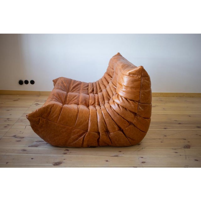 This Togo has been reupholstered with new foam and high-quality new fabric, keeping its inner structure, giving the item...