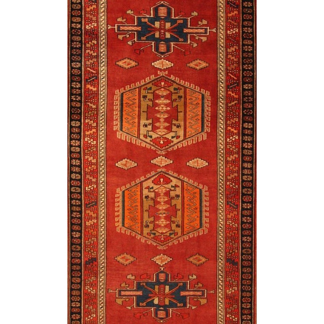 Antique hand-knotted Middle Eastern rug | Size: 440 x 151 cm | Knot density: approx. 90.000 knots/m² | Material: 100% wool...