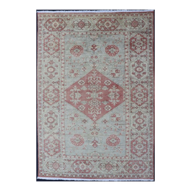 Modern Khotan Rug in Wool With Medallion Design in Light Blue and Coral For Sale