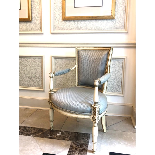 Painted Petite Louis XVI Style Painted Arm Chair. Bergere Fauteul Powder blue silk upholstery with padded arms.
