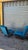 A charming pair of vintage mid-century modern armchairs, characterized by geometric lines and seats entirely upholstered...