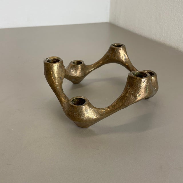 Article: Brutalist candleholder Origin: Germany Design producer: Michael Harjes Material: bronze Decade: 1960s : This...