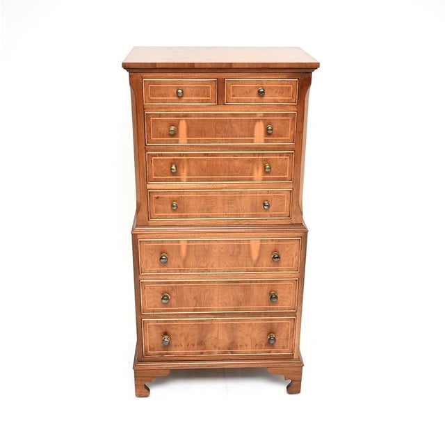 A beautiful antique Georgian style yew wood chest on chest of drawers. This was made in England, it dates from around the...