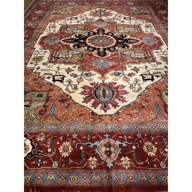 Serapi design rug. Handmade and hand-knotted in fine lambswool on a cotton foundation. Vegetable dyed hand-spun wool rug....