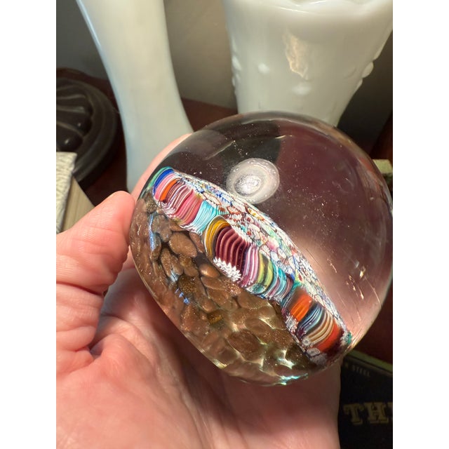 Amazing colors in this handmade Murano glass unmarked paperweight. Three inches tall and ten inches in diameter. So many...