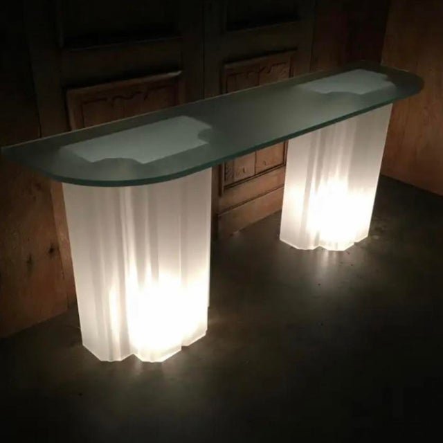 This is one of the most incredible postmodern pieces I have seen. It lights up from beneath the pedestals to illuminate...