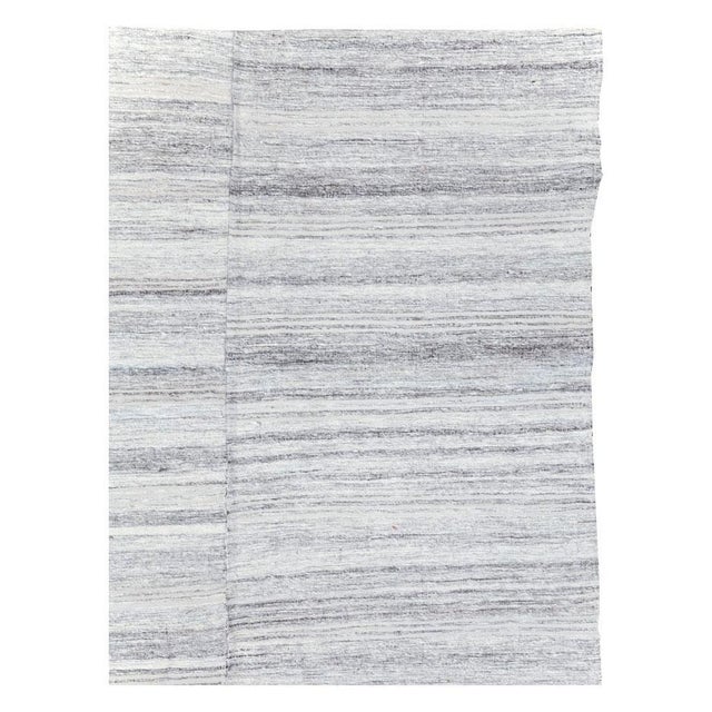 A vintage Turkish flatweave Kilim accent rug handmade during the mid-20th century. Measures: 6' 2" x 8' 11".