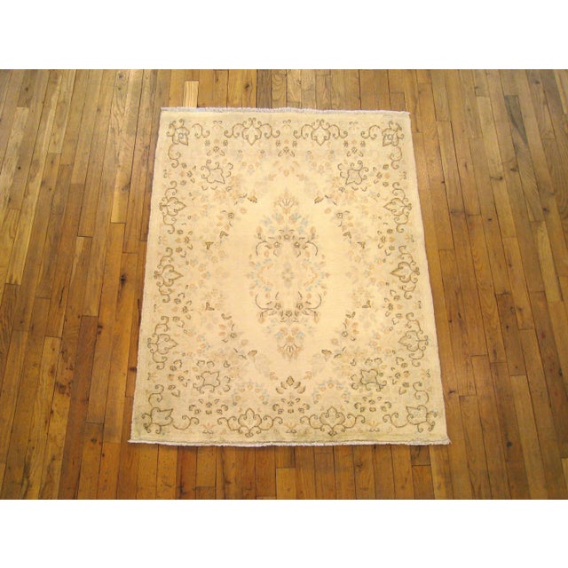 A vintage Persian Kerman rug from Persian Gallery New York, size 4'0" x 3'2", circa 1940. This fine handwoven wool carpet...