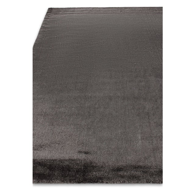 Casual, yet elegant. Hand-loomed with premium art silk, the beautiful texture and rich color palette make each rug in the...