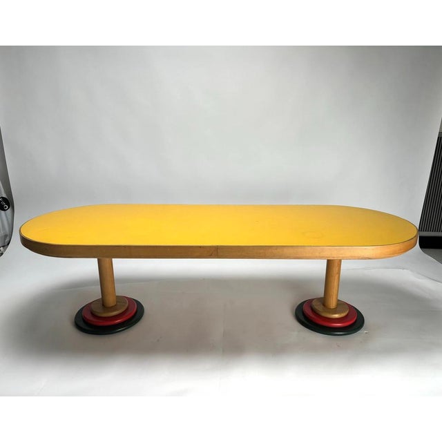 Important Post-modern coffee table in colored wood. This is a rare and very original table, capable of furnishing your...