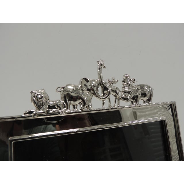 Polished Silver Tone Michael Aram "Noah's Ark" Decorative Picture Frame. Clear glass inset. Size: 8.25"W x 9'H x 1"D Image...