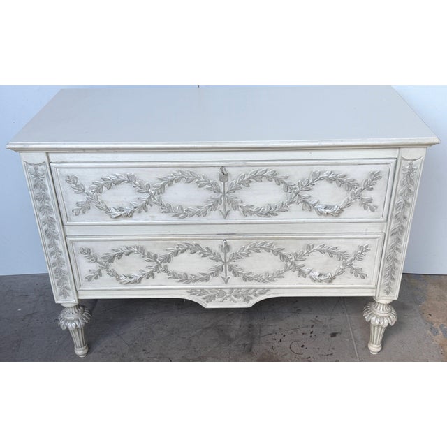Italian Hand-Carved Tuscan Chest with Laurel Garlands in Antiqued Silver Leaf, Handmade in Italy This elegant hand-carved...
