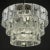 Unique vintage large crystal chandelier made in Italy in the 1960s. Three-tier metal base and 45 glass elements. The...