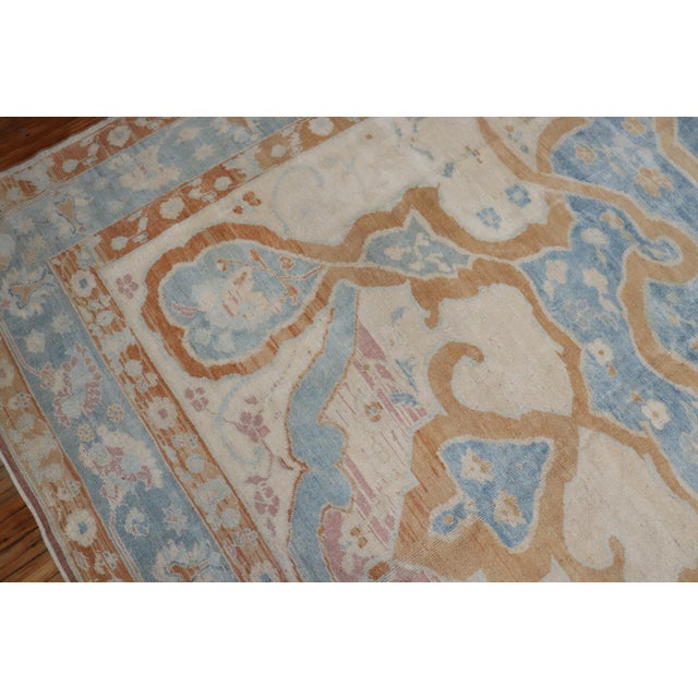 Room size vintage Turkish Rug win blue and bronze accents on an ivory field. Details rug no. 31504 size 10' x 12' 6" (305...