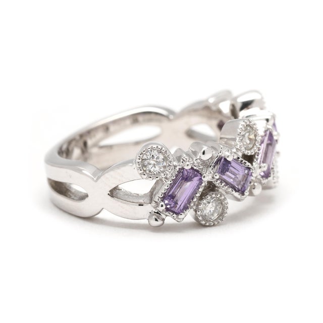 Stones: diamond, 6 stones round brilliant 2.25 mm approximately .25 total carats G-H color, SI2-I1 clarity pink sapphire,...