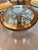 Beautiful solid Mahogany wood, hand carved coffee table. Glass top and metal underlay. Excellent condition. It has been in...