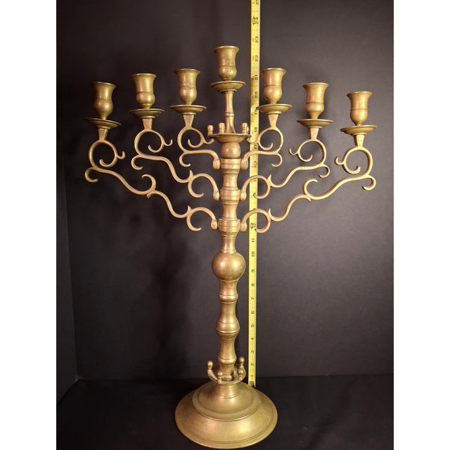 Up for offer is an impressive, museum-quality 19th-century solid brass 7-branch synagogue menorah (Menorat HaKodesh),...