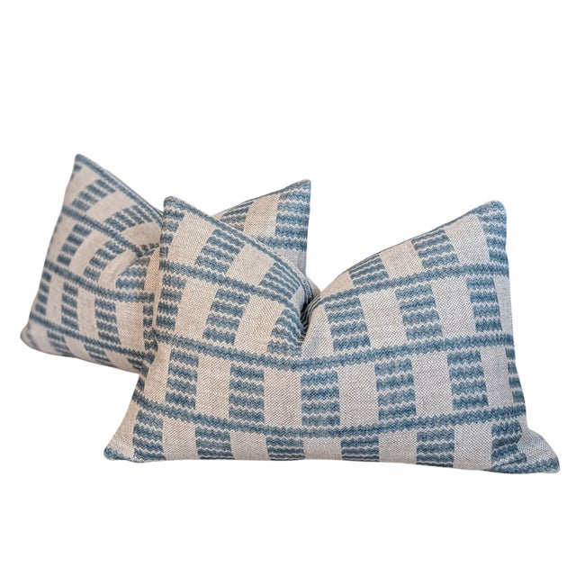 Fermoie Cove features geometric waves in blue on a heavyweight natural linen. Print is front and back, and pillows have...