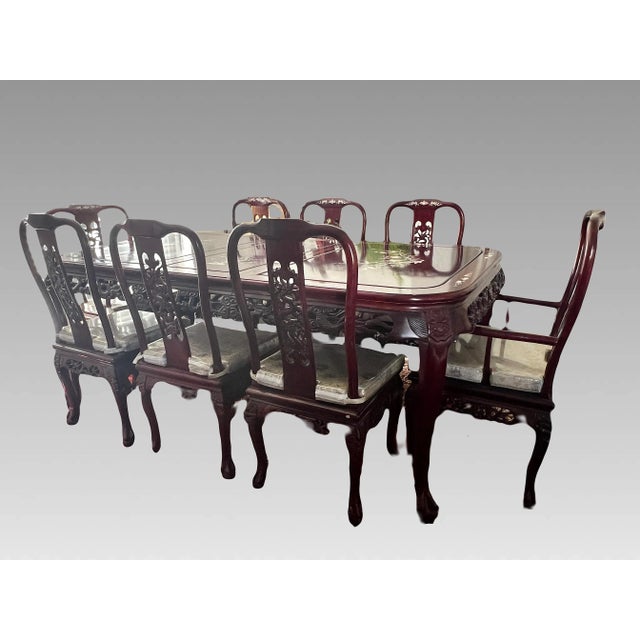 Very high quality solid rosewood dining set for 4 - 8 people, inlaid with gleaming mother of pearl. The work is delicate...