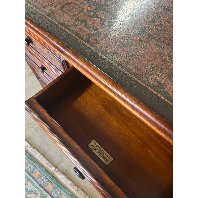 Mahogany five drawer chest by Theodore Alexander featuring uniquely decorated top, sides, and drawer fronts. Good vintage...