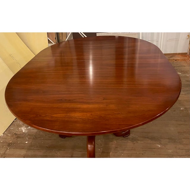 This is a gorgeous fine quality table in good vintage condition made of Wild Black Cherry Wood by Henkel Harris in...