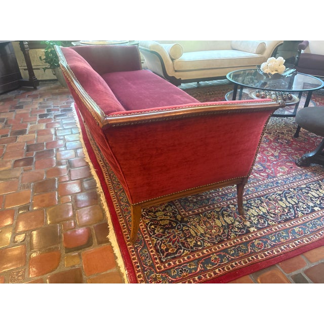 Beautiful red velvet antique sofa has been in my family for 25 years and meticulously taken care of needs a new home