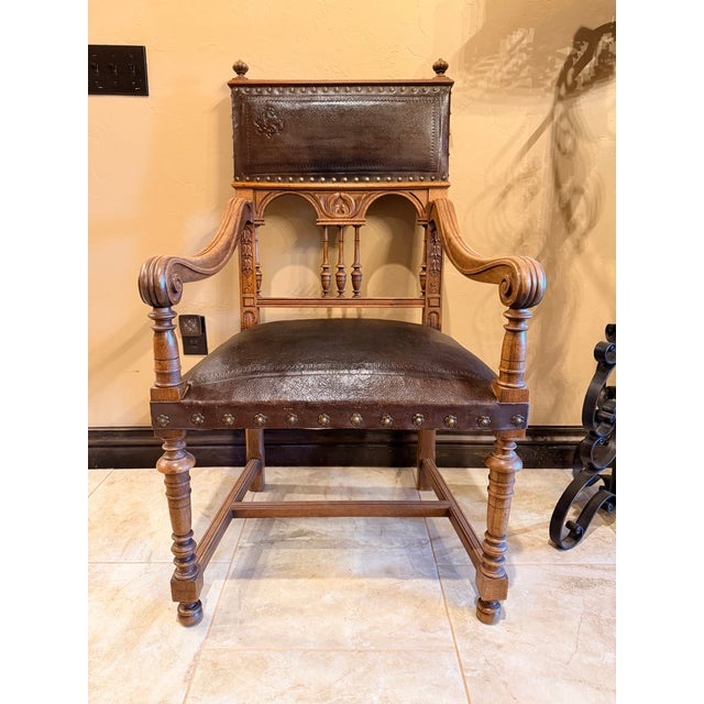 Early 20th Century Vintage Renaissance Revival Carved Wood and Embossed Leather Armchairs – A Pair For Sale - Image 5 of 11