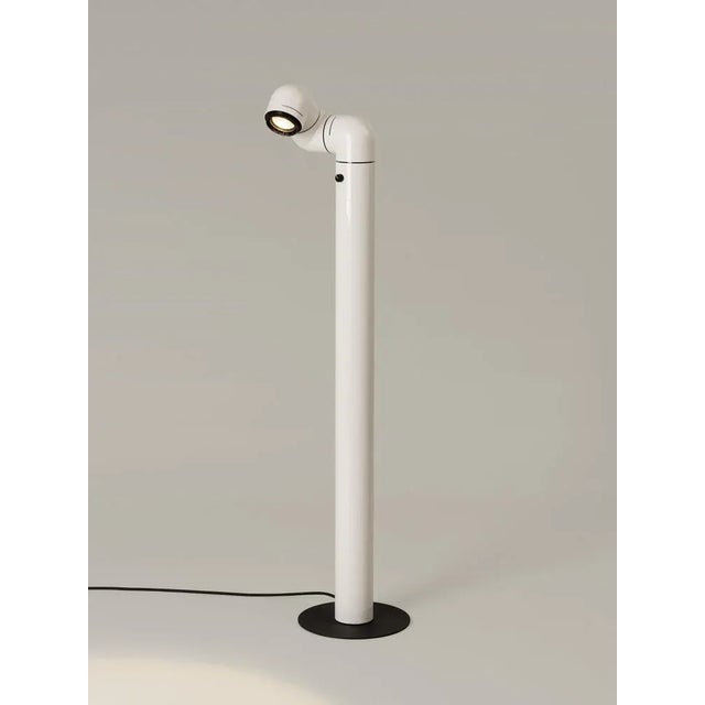 White tatu floor lamp by andré ricard dimensions: d 23 x w 26 x h 116 cm materials: metal, plastic. Available in red or...