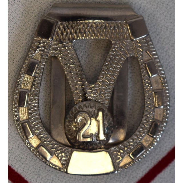 Sz: 1 7/8" x 1 3/4" x 1/8"D *"21" Club bar cloth sold separately* The 21 Club, often simply 21, was a traditional American...