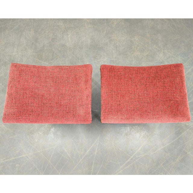 Pair of mid-century stools produced in Czechoslovakia during the 1960s. The stools feature sculptural seats with new...