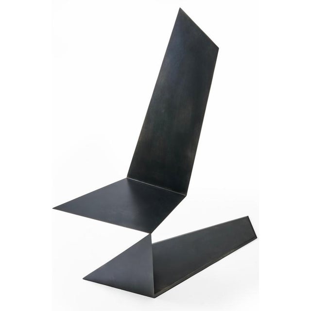 Dark side chair, aluminium by orfeo studio dimensions: w 130 x d 50 x h 140 cm. Material: aluminium finish: patina finish...
