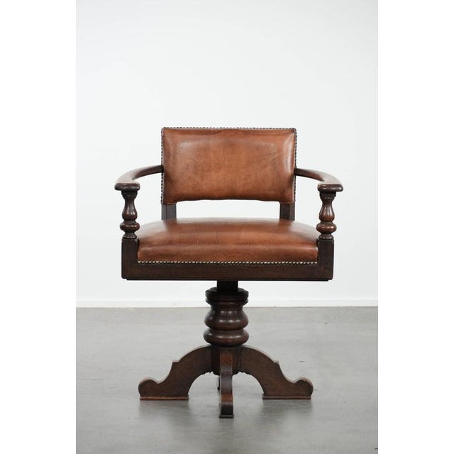 We are offering this wonderful, elegant antique sheepskin desk chair with a heavy wooden frame. This wonderful sheepskin...