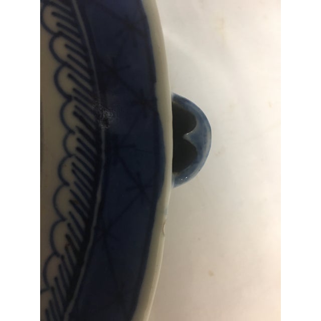 According to the Victoria and Albert museum, a "Nanking warming plate is an antique warming plate, typically made of...