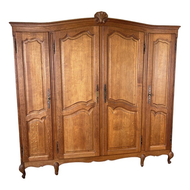 Vintage Louis XVI French Four Door Oak Carved Armoire For Sale