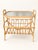 Elegant vintage Scandinavian rattan magazine rack and side table, dating from approximately the 1960s. This charming Mid-...